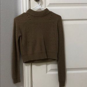 A long sleeve cropped sweater